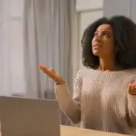Person staring up at the ceiling in a state of confusion as to why the AC isn't working.