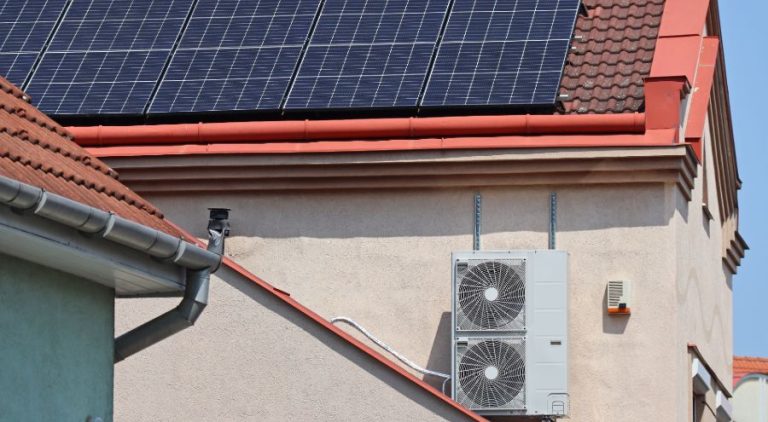 Rooftop solar panels powering a home air conditioner system in Las Vegas